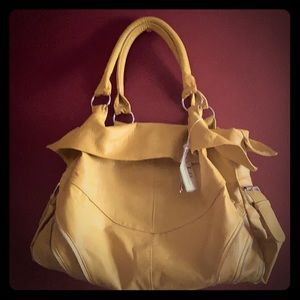 Pleather hand or shoulder bag; attractive design